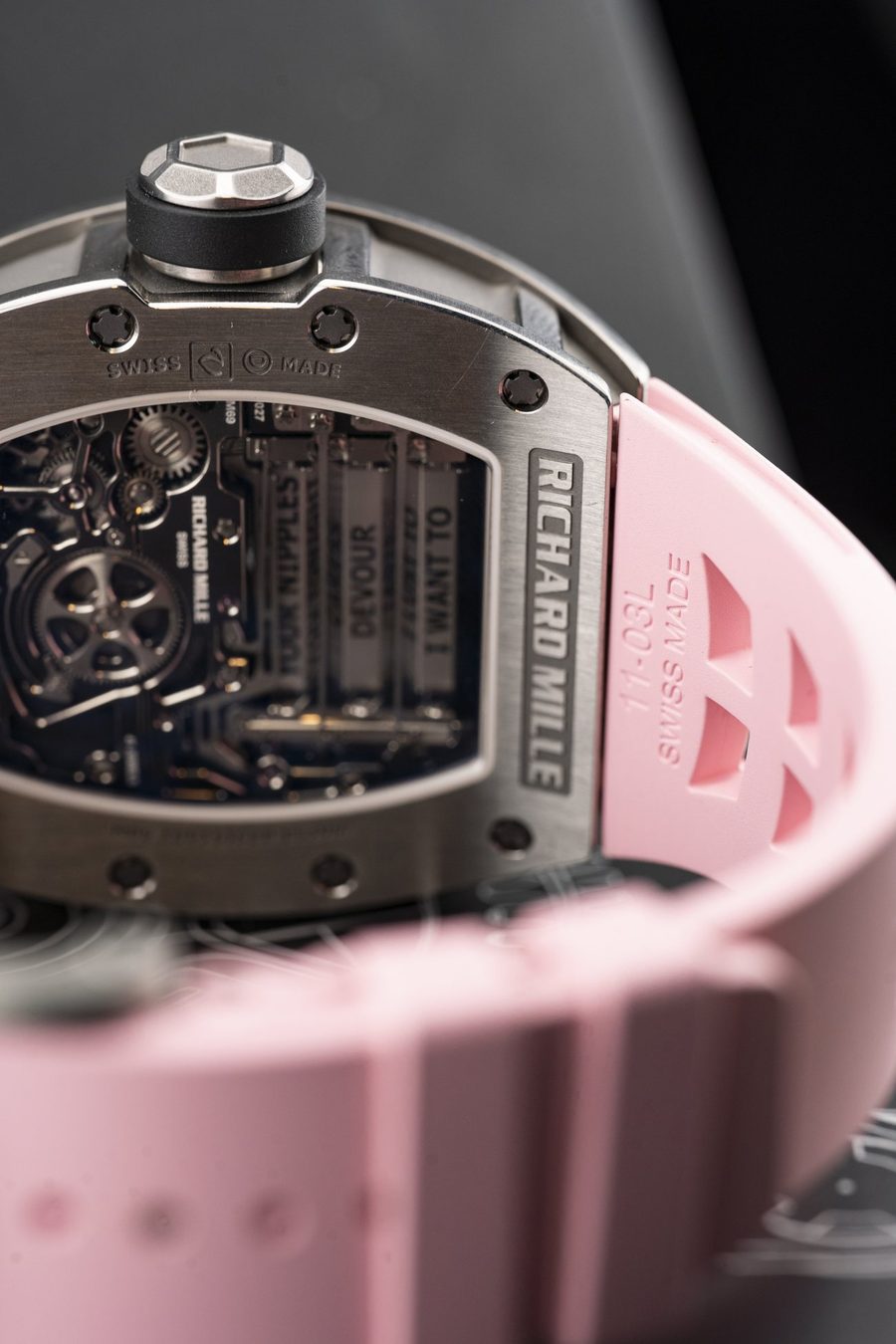 RM 69 watch face detail under directional light